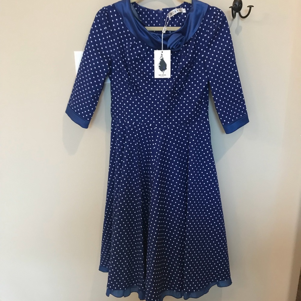 Blue with white polka dots swing dress.